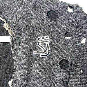 Grey jacket with wholes from Shane Justin